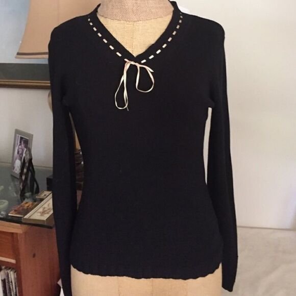 Liz Claiborne  - Picture 1 of 3